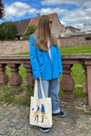 RECYCLED "HUMANITY IS WHAT UNITES US" TOTE BAG